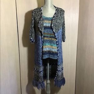 Hand knit 3/4 length Sweater jacket with fringes on bottom. Handmade by Silvia